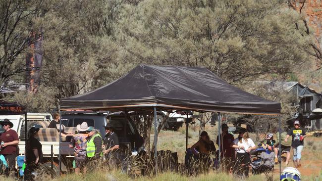 Spectators have gathered to watch competitors tackle day one of the 2024 Tatts Finke Desert Race.