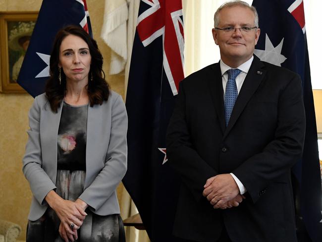 New Zealand Prime Minister Jacinda Ardern (left) and Australian Prime Minister Scott Morrison are seen during the signing of the Indigenous Collaboration Arrangement at Admiralty House in Sydney, Friday, February 28, 2020. (AAP Image/Bianca De Marchi) NO ARCHIVING