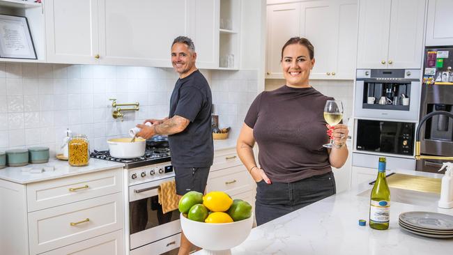 Margaux and Corey Parker in their kitchen in Daisy Hill. Picture: Nigel Hallett