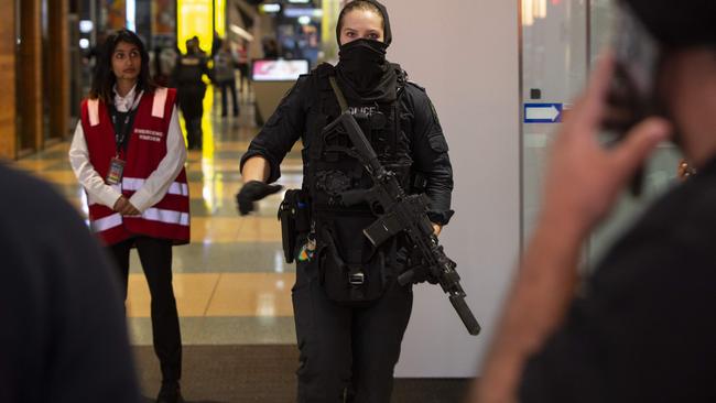 Heavily armed police swooped on Westfield Marion on Sunday. Picture: Brett Hartwig