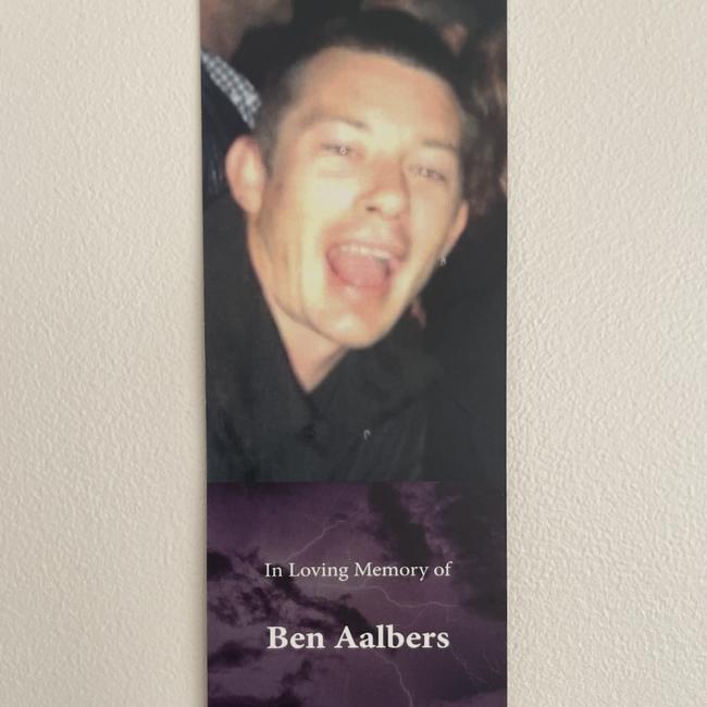 Bookmarks with photos of Mr Aalbers and his children printed on them with one of his iconic quotes, “I can do everything except give birth”, were given to guests at the funeral.