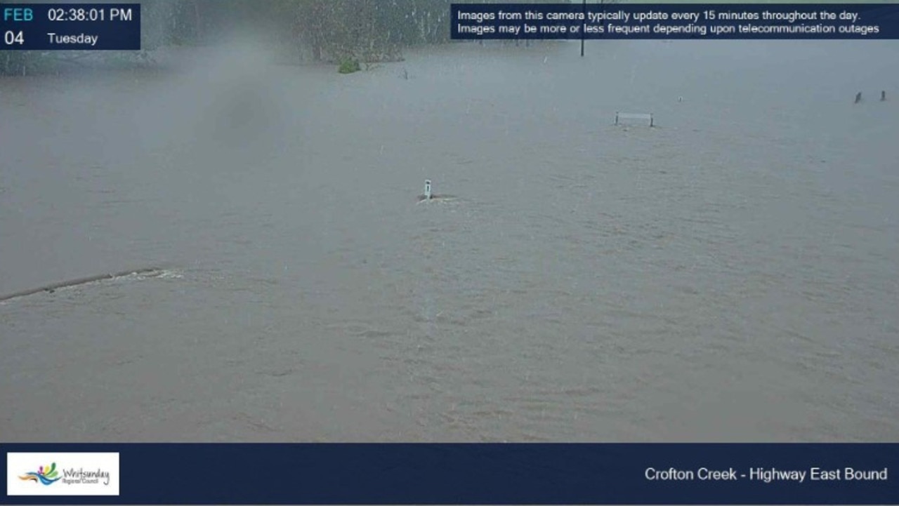 Crofton Creek Bridge is underwater. Tuesday, February 4, 2025 as the Whitsundays is soaked. Image: Whitsunday Regional Council flood cameras