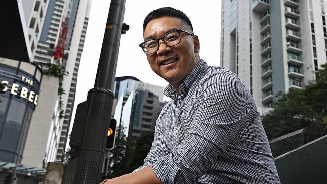 14/10/2024 : William Chen, in front of 108 Albert st where he owns an investment unit, Brisbane.  Chen is an IT Worker who owns two investment properties and is working on getting a third. pic: Lyndon Mechielsen/Courier Mail