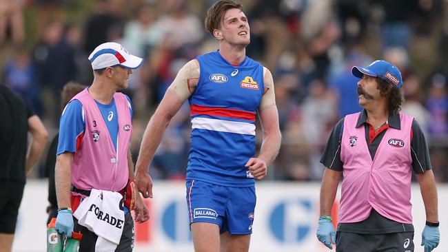 Jordan Roughead comes off injured. Picture: Wayne Ludbey