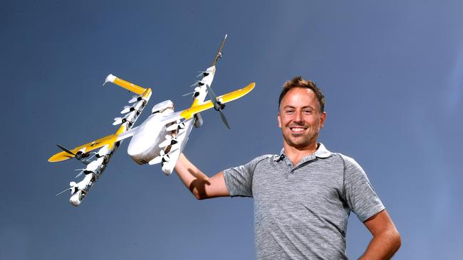 Wing drone chief executive James Ryan Burgess with a drone at the Crestmead Community Park on September 7, when the drones were grounded due to bushfires. AAP/John Gass