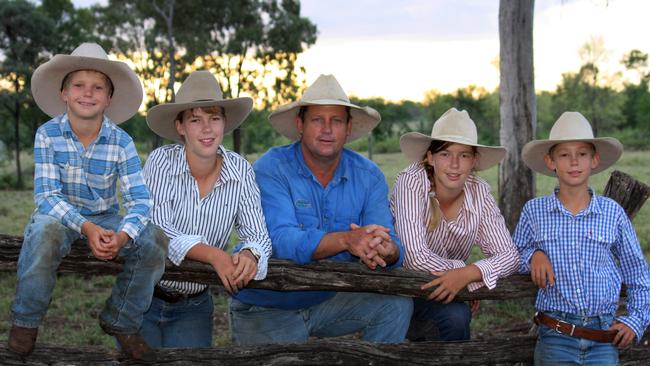 Mooving forward: Blair and Josie Angus and their children.