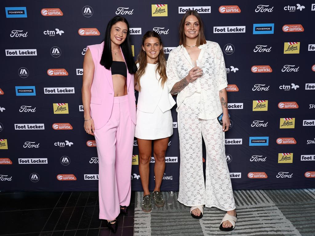 The Flames’ Emma Clarke, Isabella Brancatisano and Cayla George. Photo by Graham Denholm/Getty Images for WNBL