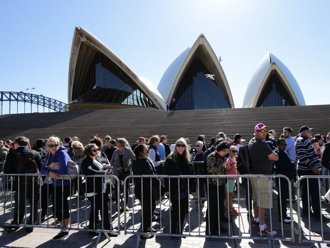 Royal watchers arrived early at the Opera House in anticipation of meeting the prince. Picture: Stephen Cooper