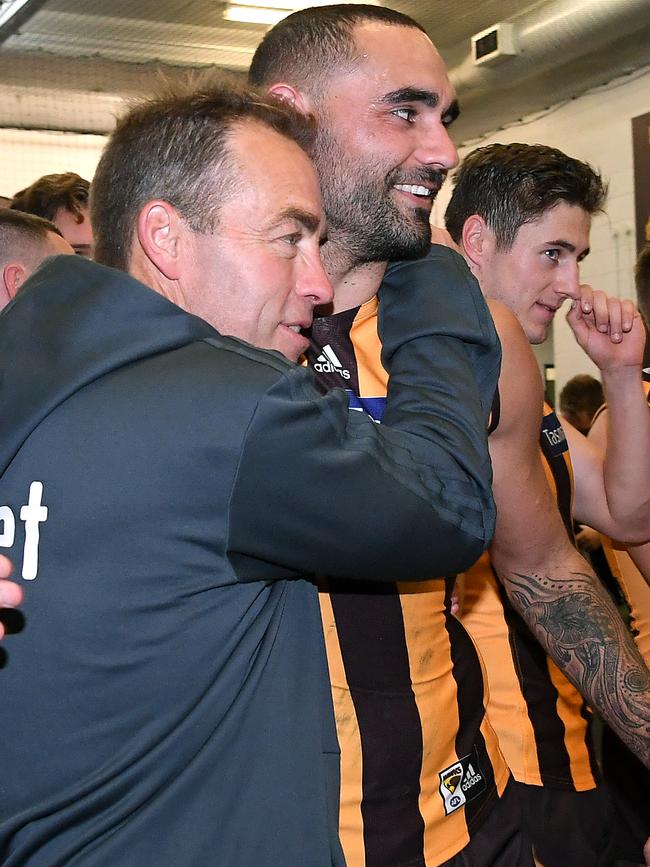 Hawthorn coach Alastair Clarkson, pictured embracing Shaun Burgoyne, is considered the best in the business in the AFL. Picture: Getty Images