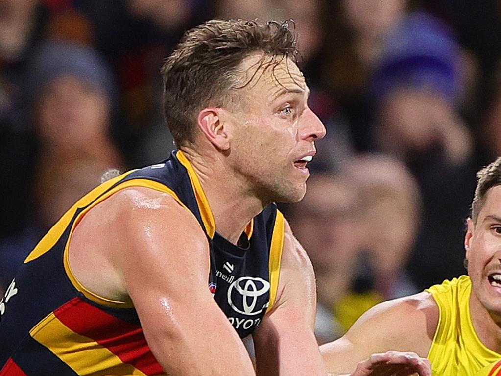 ADELAIDE, AUSTRALIA – JUNE 06: Brodie Smith of the Crows and Liam Baker of the Tigers during the 2024 AFL Round 13 match between the Adelaide Crows and the Richmond Tigers at Adelaide Oval on June 06, 2024 in Adelaide, Australia. (Photo by Sarah Reed/AFL Photos via Getty Images)