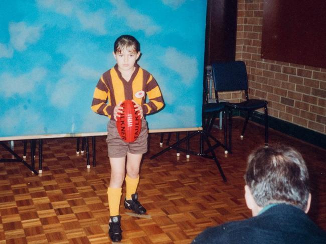 Moana Hope as a young footy-mad girl.