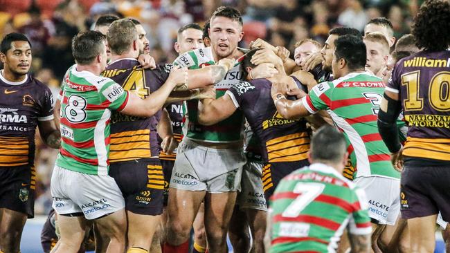 A scuffle broke out between Broncos and Rabbitohs players after Sam Burgess tackled Joe Ofahengaue.