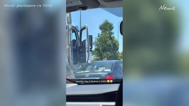 Angry truck driver strikes car with wooden bat in Sydney traffic | Video | news.com.au — Australia's leading news site