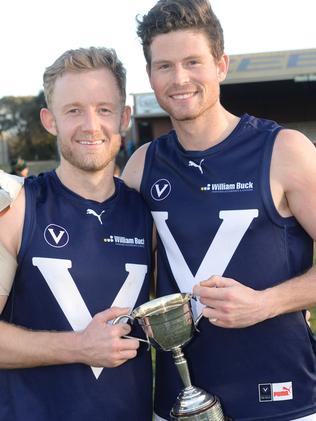 Victorian skipper Tim Nixon (left) and Blair Atkins celebrate with the silverware.  Picture: Chris Eastman