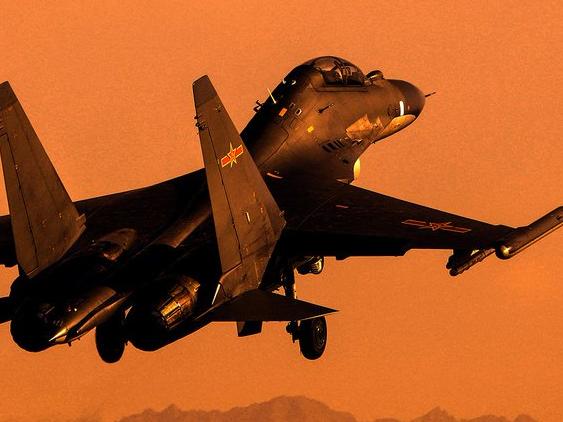 Chinese fighter jets scramble into a sunrise. Picture: PLA