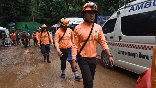 Rescue workers at the Tham Luang cave area. Picture: AFP.