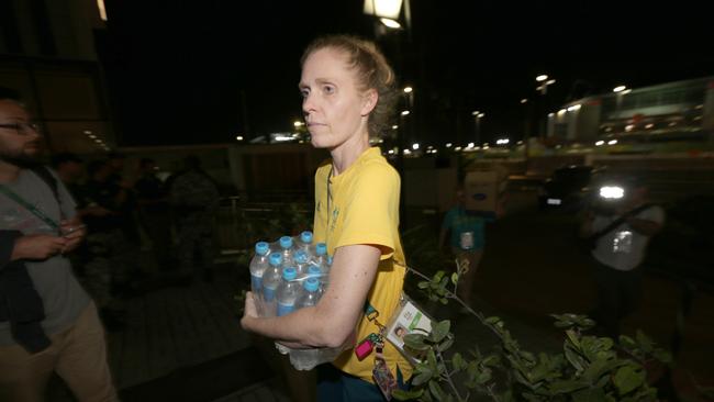 Rio Olympics Games 2016. Australian Athletes being held by Police at a police station opposite Olympic Park. Australian team officials bring water into the police station. RIO DE JANEIRO, Brazil. Picture Cameron Tandy.