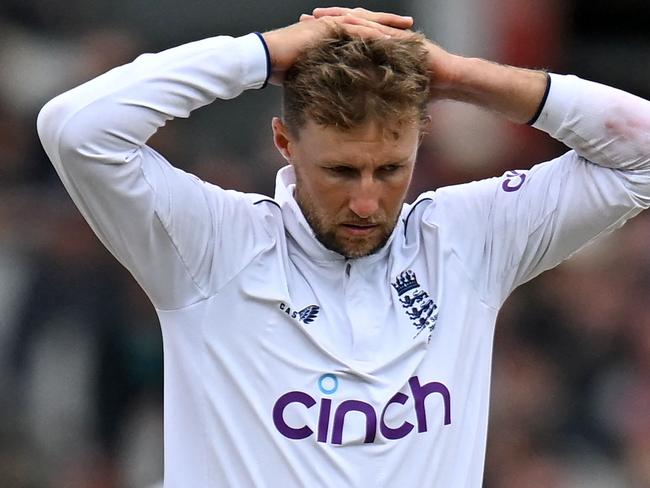 England's Joe Root reacts while bowling on day four of the fourth Ashes cricket Test match between England and Australia at Old Trafford cricket ground in Manchester, north-west England on July 22, 2023. (Photo by Oli SCARFF / AFP) / RESTRICTED TO EDITORIAL USE. NO ASSOCIATION WITH DIRECT COMPETITOR OF SPONSOR, PARTNER, OR SUPPLIER OF THE ECB