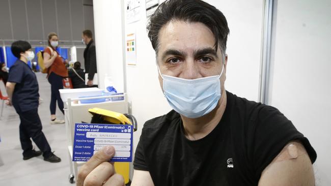 Kosta Dimitrakis, 44, was happy to get his vaccination. Picture: David Caird