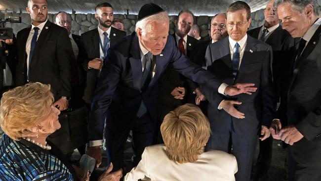 US President Joe Biden speaks to Holocaust survivors Giselle Cycowicz and Rena Quint Picture: AFP