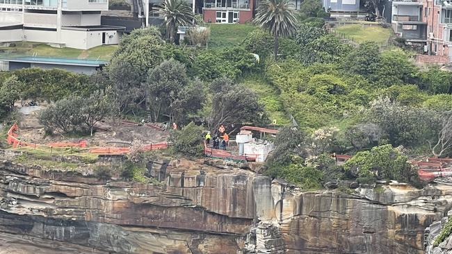 Police were seen speaking to construction workers on Friday morning.