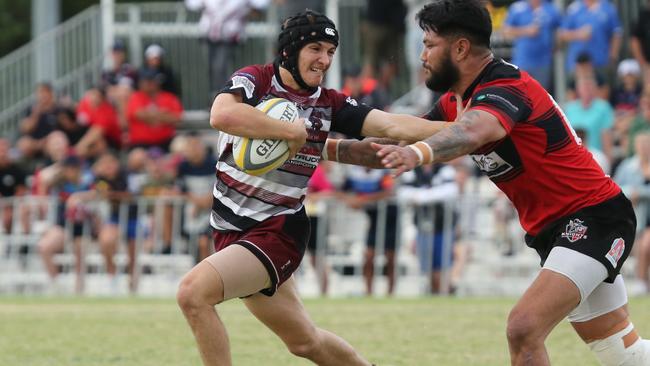 GCDRU Gold Coast District Rugby Union First Grade Grand Final. Griffith University Colleges Knights v Nerang Bulls. Will Bird fends Larry Hermens, Pic Mike Batterham