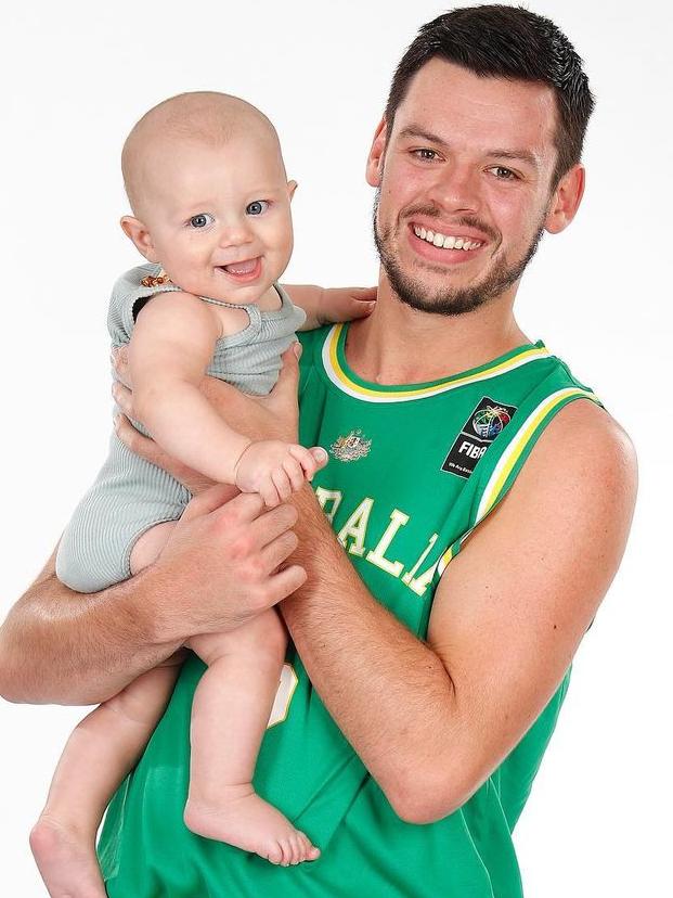 Jason Cadee in his Boomers’ kit with son Louis. Picture: Instagram