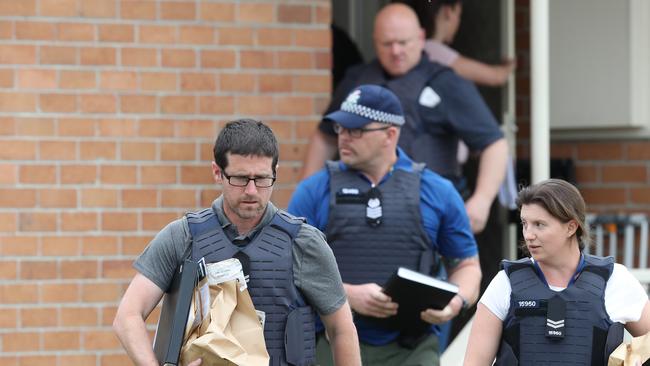 Police raid a Melbourne house last month as part of a counter-terrorism operation. Picture: AAP