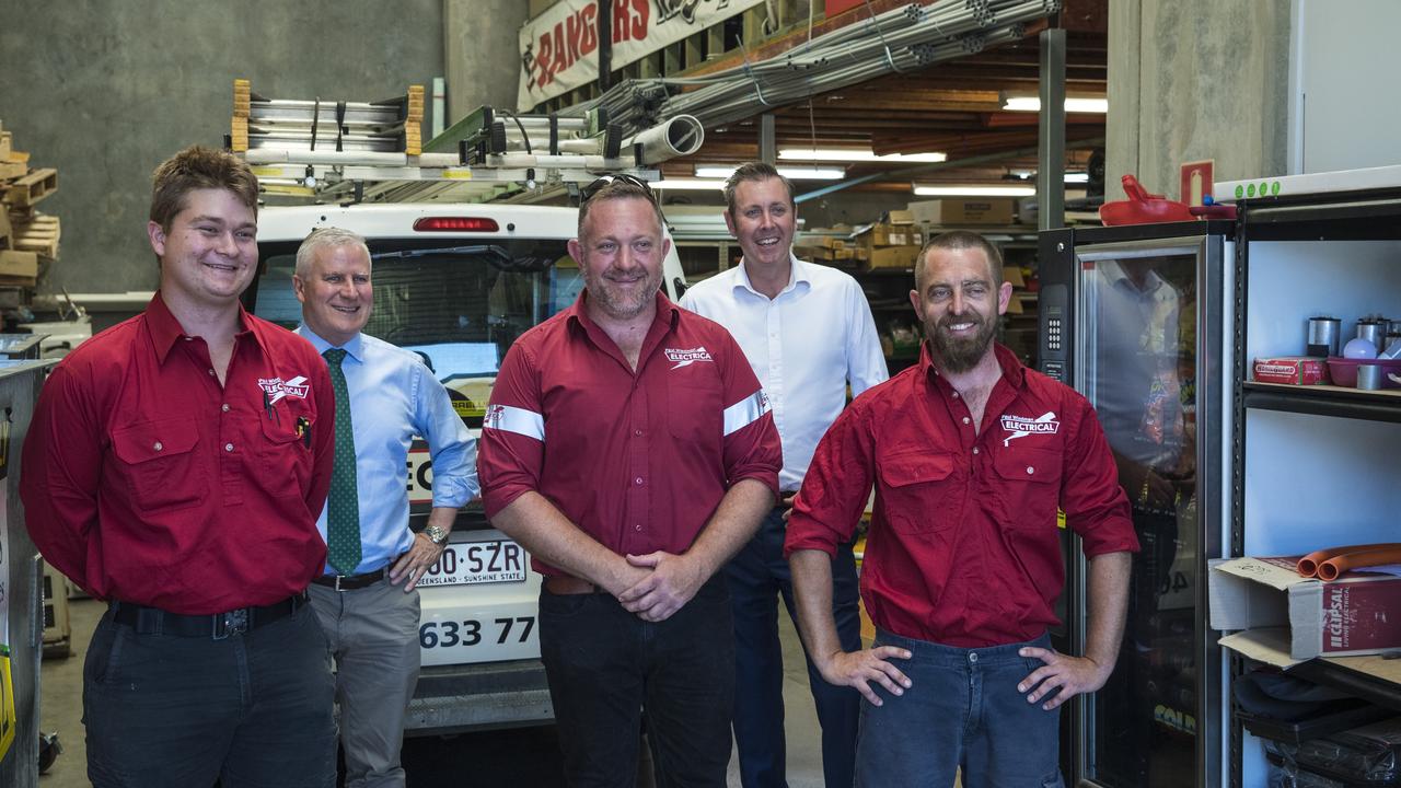 Deputy Prime Minister Michael McCormack (back, left) poses for a photo with (front, from left) Elliott Bruffer business owner Paul Wiedman, Alex Rauchle and (back, right) Groom LNP candidate Garth Hamilton, Monday, November 23, 2020. Picture: Kevin Farmer