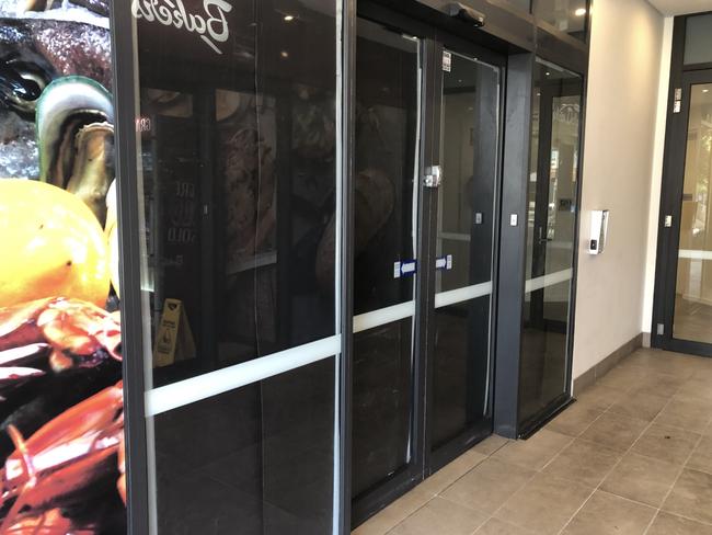 The blacked out windows of the future Supa IGA supermarket in Albert St, Freshwater. Picture: Jim O'Rourke