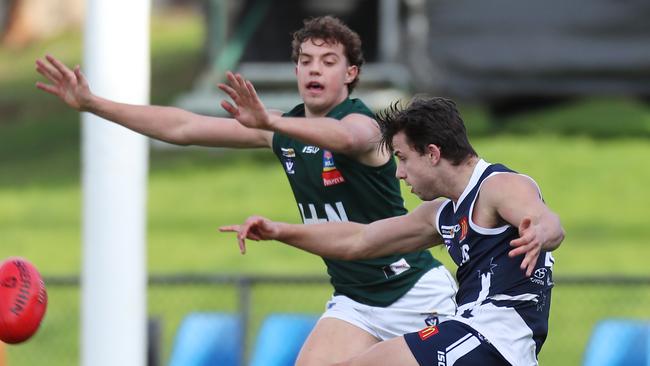Ballarat’s Kyle Borg gets a kick away. Picture Yuri Kouzmin