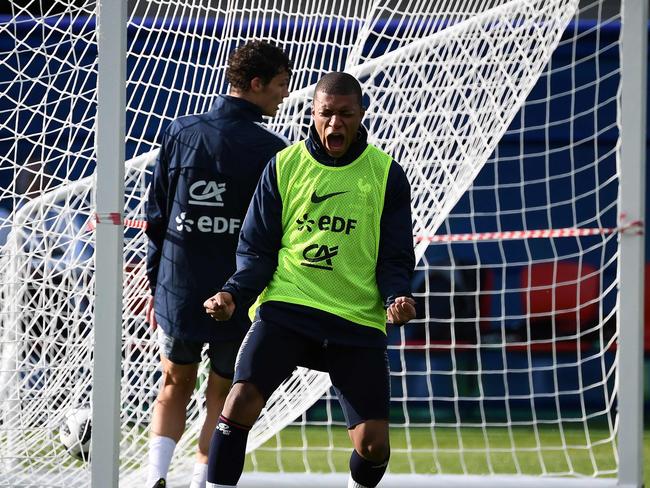 France's forward Kylian Mbappe reacts after a goal during a training session. Pic: AFP