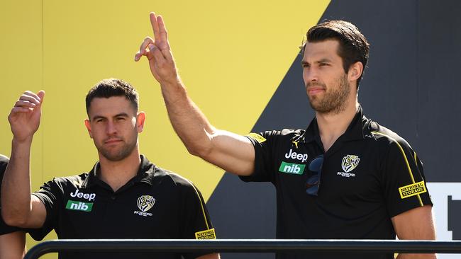 Injured duo Jack Graham and Alex Rance thank the Richmond supporters at the club’s family day on Sunday. Picture: Quinn Rooney/Getty Images.