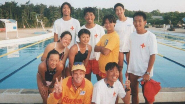 Saving lives: Wayne Heneker in Chiba, Japan, with a group of fellow lifesavers.