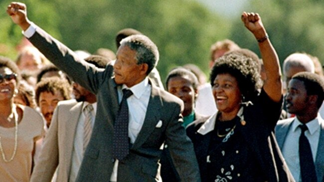 African National Congress (ANC) leader Nelson Mandela and wife Winnie raise fists upon his release from Victor Verster prison, 11 February 1990 in Paarl. After the banning of the ANC in 1960, Nelson Mandela argued for the setting up of a military wing within the ANC. On June 12, 1964, eight of the accused, including Mandela, were sentenced to life imprisonment. Nelson Mandela was released 11 February 1990. AFP PHOTO ALEXANDER JOE