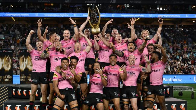 SYDNEY, AUSTRALIA - OCTOBER 06: Isaah Yeo and Nathan Cleary of the Panthers hold aloft the Provan-Summons Trophy after winning the 2024 NRL Grand Final match between the Melbourne Storm and the Penrith Panthers at Accor Stadium on October 06, 2024, in Sydney, Australia. (Photo by Quinn Rooney/Getty Images)