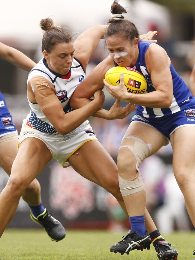 Crows midfielder Ebony Marinoff tackles Kangaroo’s Emma Kearney during their Round 5 AFLW match at Avalon Airport Oval last season. Picture: AAP/Daniel Pockett