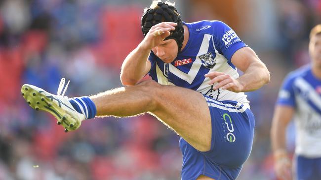 Matt Burton launches a bomb, a sight the Storm expect to see often. Picture: NRL Photos