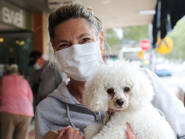 DAILY TELEGRAPH - Pictured is Louise Jones and her dog at Avalon Beach today as the Northern Beaches is still cut off from the rest of Sydney due to the COVID-19 lockdown. Picture: Tim Hunter.