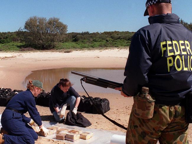 Australian Federal Police officers examining drug haul at Port Macquarie after nation's biggest ever heroin seizure. Picture: Supplied