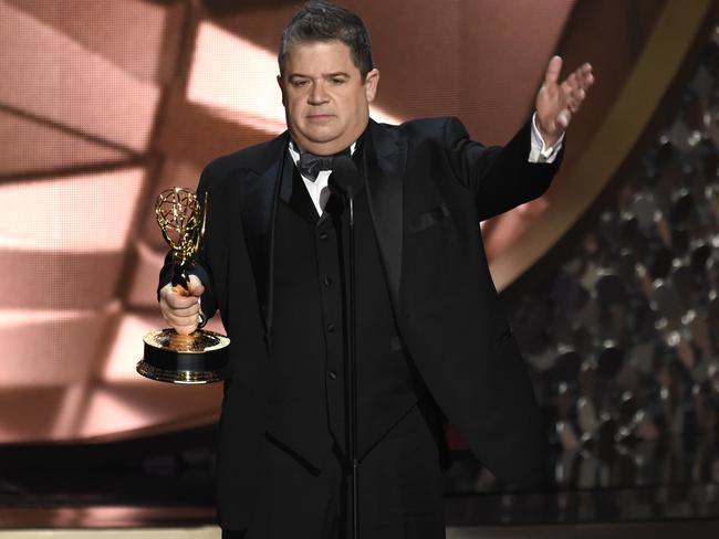 Patton Oswalt accepts the award for outstanding writing for a variety series at the 2016 Emmys.