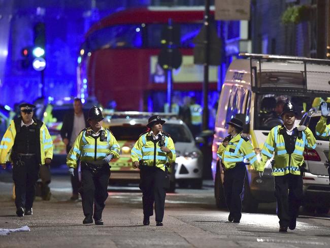 Police officers on Borough High Street. Picture: Dominic Lipinski/PA via AP