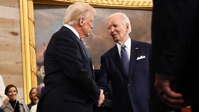 Trump and Joe Biden in the Rotunda of the US Capitol. Picture: AFP