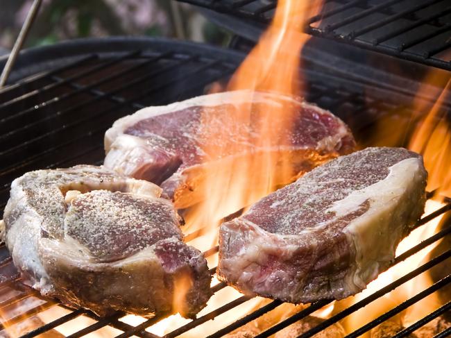 Food being grilled on a bbq .. Steaks On The Grill