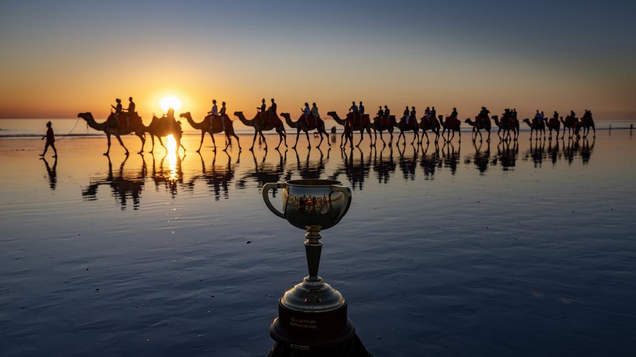 Broome, WA: The Melbourne Cup cruises the sands of Cable Beach with these camel companions. Picture: Colin Murty