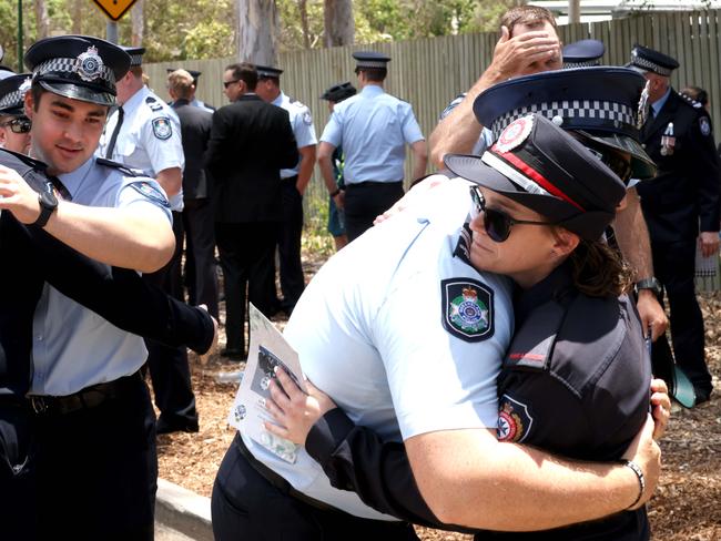 Mourners at the memorial service with full police honours for fallen constables Rachel McCrow and Matthew Arnold at Brisbane Entertainment Centre. Picture: Steve Pohlner
