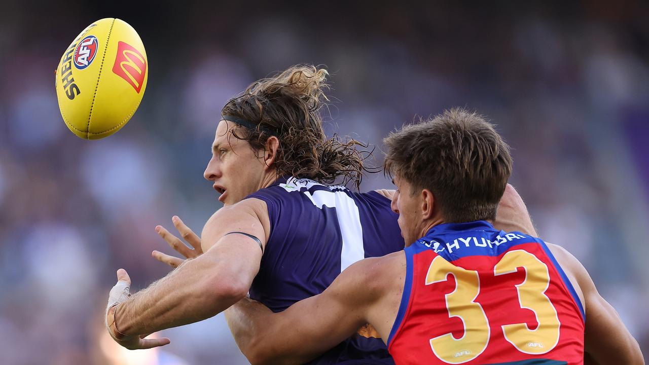 Nat Fyfe chases a hard ball. Picture: Paul Kane/Getty Images