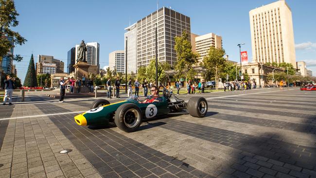 A 1967 Brabham BT21 drives down Wakefield St during the Adelaide Motorsports Festival in 2017. Picture: AAP / James Elsby