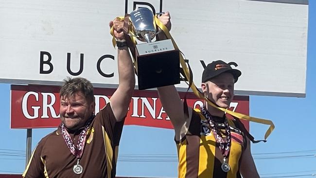 Inverleigh coach Ben Webb and captain Adam Muir with the GDFL reserves cup. Picture: Ben Cameron