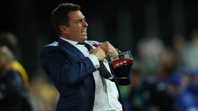 Paul Okon of the Mariners celebrates the win over Sydney FC.